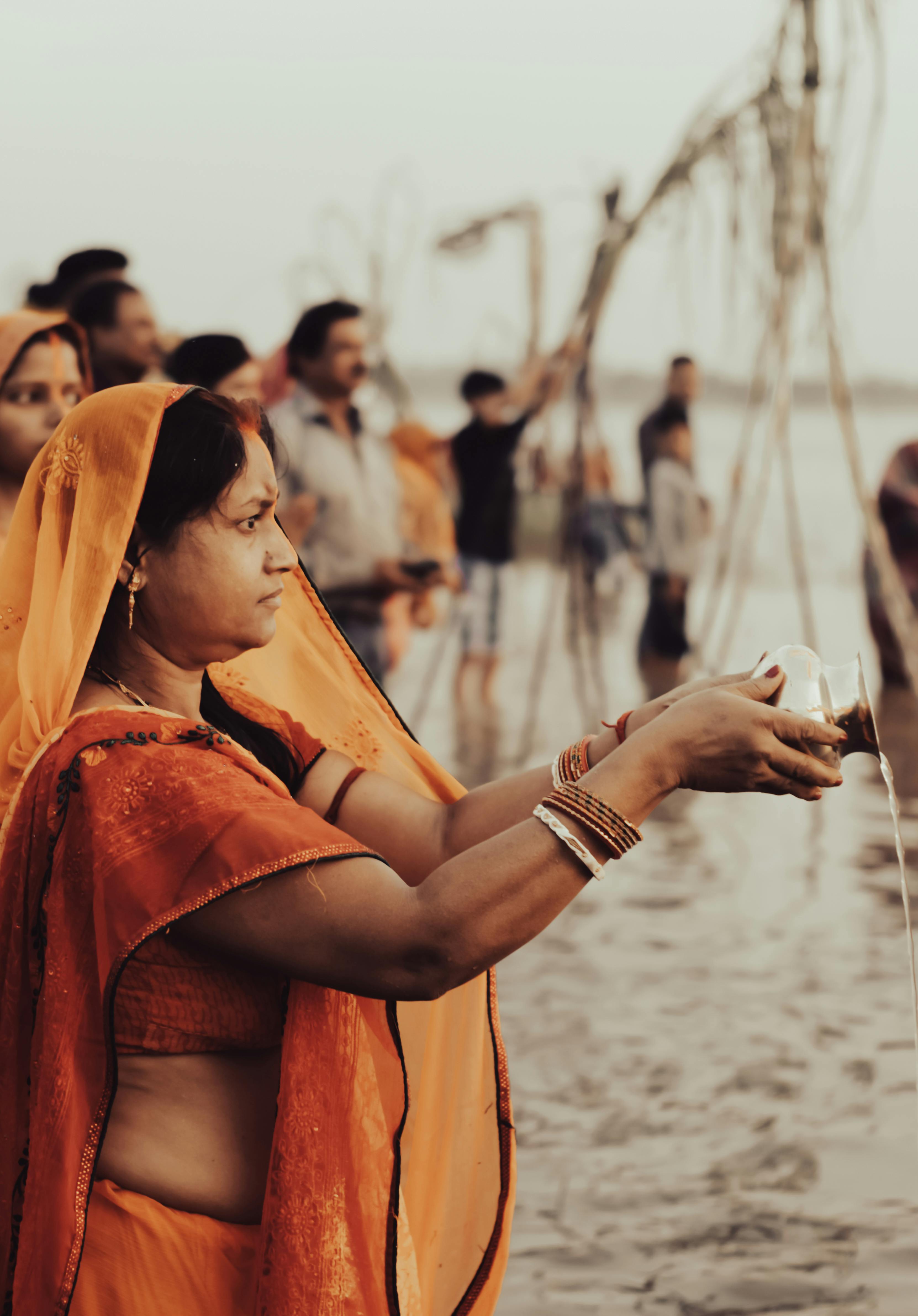 Hands preparing offerings